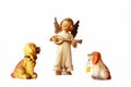 Dogs and little angel figure Royalty Free Stock Photo