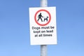 Dogs must be kept on a lead or leash sign and icon Royalty Free Stock Photo