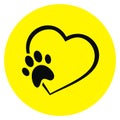 Dogs paw,black illustration on yellow circle background, vector icon Royalty Free Stock Photo