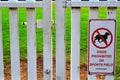 Dogs prohibited sign on entrance to sports field Royalty Free Stock Photo