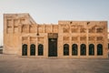 Doha city street with traditional Islamic architecture buildings