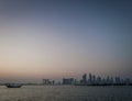 Doha city urban skyline view and dhow boat in qatar Royalty Free Stock Photo