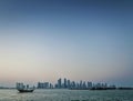 Doha city urban skyline view and dhow boat in qatar Royalty Free Stock Photo