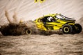 Off road buggy car in the sand dunes of the Qatari desert.