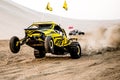 Off road buggy car in the sand dunes of the Qatari desert.