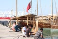 Doha qatar corniche beache fishing people Royalty Free Stock Photo