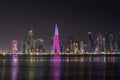 Doha, Qatar - December 6, 2022: The West Bay city skyline at night, Doha, Qatar. Royalty Free Stock Photo