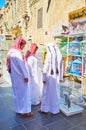 Qatari teens choose the pet birds, Souq Waqif, Doha, Qatar Royalty Free Stock Photo