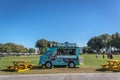 Doha, Qatar - Jan 9th 2018 - A food truck selling foods and beverages in a public park, green open area, in Doha, Qatar