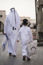 The Qatari family in traditional attire.