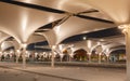 Doha,qatar- May 03 2021 : Car park with umbrella to provide shade for vehicles during the summer period