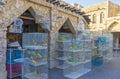 Numerous cages with wide variety of birds, making a big noise in covered galley of Birds Market of Souq Waqif in Doha, Qatar