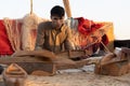 craftsman making traditional toy ship making, handicraft During the Dhow festival at Katara beach