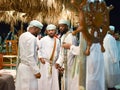 Omani men in traditional clothing Royalty Free Stock Photo