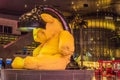 31.05.2021, Doha, Qatar: Yellow lamp teddy bear sculpture in the middle of the terminal at the Hamad International