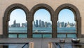 Doha skyline through the arches of the Museum of Islamic art, Doha, Qatar Royalty Free Stock Photo