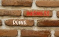 Doing business symbol. Concept words Doing business on beautiful brown bricks. Beautiful brick wall background. Beautiful brick Royalty Free Stock Photo