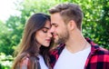 Doing everything together. hipster couple outdoor. man and woman in checkered shirt relax in park. valentines day