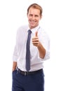 Doing great. Portrait of a handsome young business man giving a thumbs up isolated on white. Royalty Free Stock Photo
