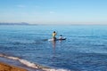 Doing paddle surfing in family with a small child