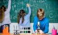 Doing research. Little kids learning chemistry in school lab. Little children at laboratory. Chemistry microscope Royalty Free Stock Photo