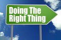 Doing The Right Thing word with green road sign Royalty Free Stock Photo