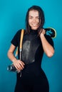Doing an underwater photo shooting. Sexy woman diver enjoy underwater shooting. Sensual woman with wet hair and diving