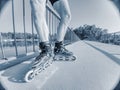 Man roller skater in speed hard shell skates. Man try trick on the pathway Royalty Free Stock Photo