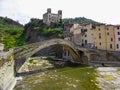 Dolceaqua - Scenic view of famous Castle Castello dei doria and ancient roman bridge ponte vecchio in Liguria