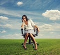 Doleful businesswoman sitting