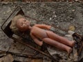 A doll in an abandoned kindergarten building after the explosion of the reactor in Chernobyl. Pripyat Ukraine.