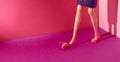Doll. A high-heeled shoe fell from her feet. Bright red pink background. Text space. Modern cinderella, fashion, lifestyle, Royalty Free Stock Photo