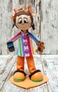 Doll holding a movil Royalty Free Stock Photo
