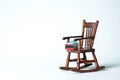 Doll house interior - a pile of books and glasses on the armchair isolated against white background Royalty Free Stock Photo