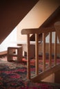 Doll House Staircase Next To Table And Chairs