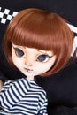 Doll redhead hair face expressive with big eyes portrait looking girl childhood toys