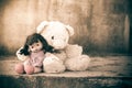 Doll sad with teddy bear Royalty Free Stock Photo