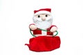 Doll Santa Claus on the sleigh on white background. merry christmas. Front