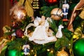 doll. vintage toys on the Christmas tree. New year retro home decor.