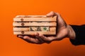 Dollar banknote in wooden hand placed on orange background in studio showing financial conceptillustration generative ai