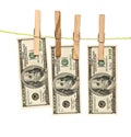 Dollar banknotes drying on rope Royalty Free Stock Photo