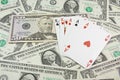 Dollar banknotes and holdem poker cards Royalty Free Stock Photo