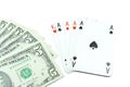 Dollar banknotes and holdem poker cards