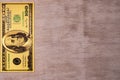 Dollar bill 100 hundred banknote gold on white wood surface Banknote