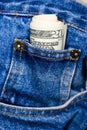 Dollar bills in blue jeans Royalty Free Stock Photo