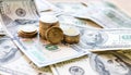 Dollar bills laid out on table. Three different columns of coins, 20 cents coin, financial crisis, money, finance Royalty Free Stock Photo