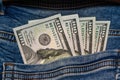 100 dollar bills in the pocket of blue jeans, studio shooting Royalty Free Stock Photo