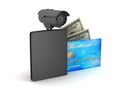 Dollar bills, wallet, credit card and video surveillance camera Royalty Free Stock Photo