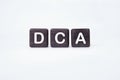 Dollar cost averaging DCA text on cubes on a white background