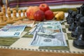 dollar and euro bills on the chess board Royalty Free Stock Photo